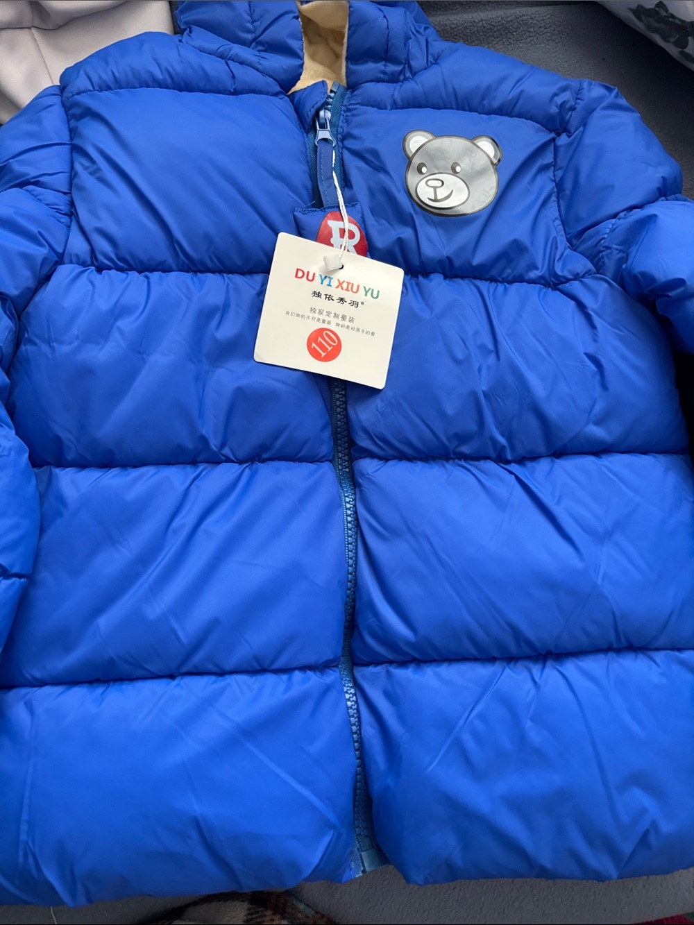 Blue Puffer Jacket with Bear Patch